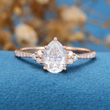 Pear cut Moissanite + Half Eternity Diamonds Engagement ring