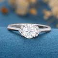 Round cut Moissanite Engagement ring