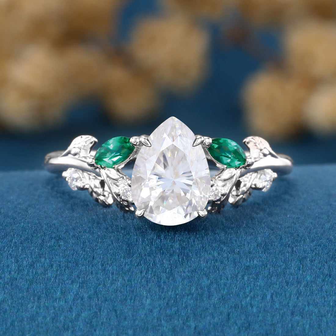 Pear cut Moissanite + Lab Emerald Engagement Ring