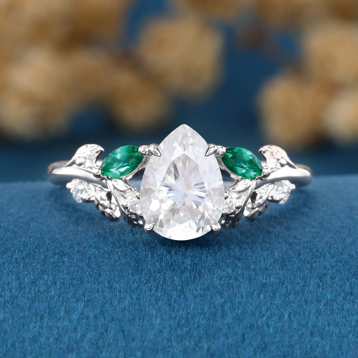 Pear cut Moissanite + Lab Emerald Engagement Ring