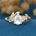 Nature Inspired Pear cut Moissanite + Lab Emerald Engagement Ring