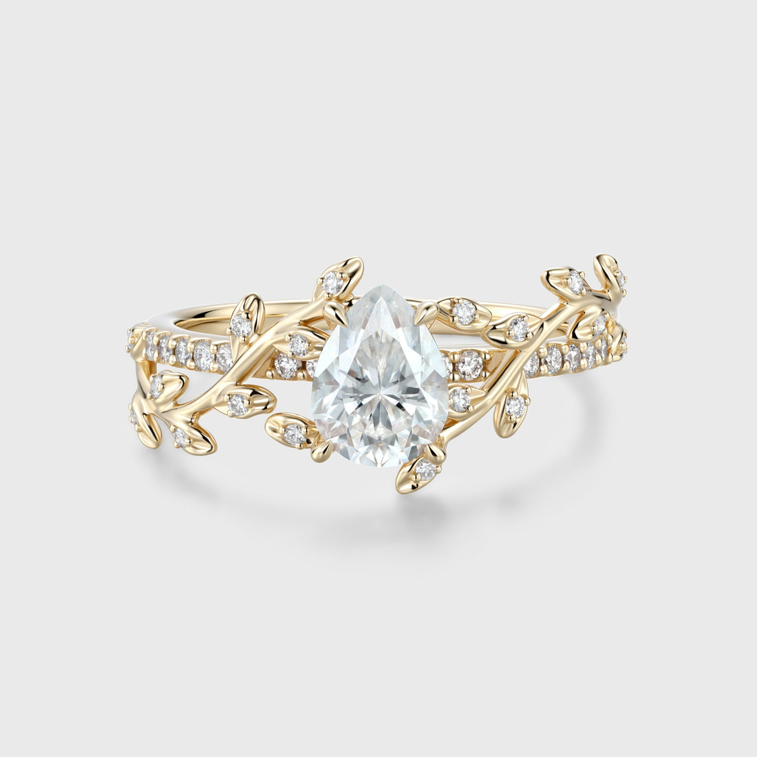 Nature Inspired Pear cut Moissanite Leaf Gold Engagement Ring