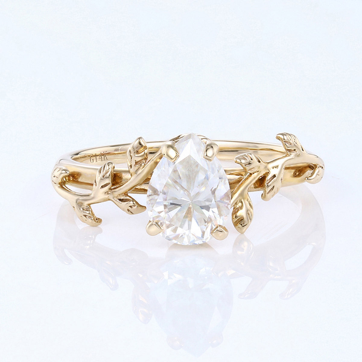 Nature Inspired Pear cut Moissanite Leaf Gold Engagement Ring