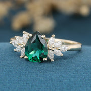 1.2 Carat pear cut Lab Emerald Engagement Ring