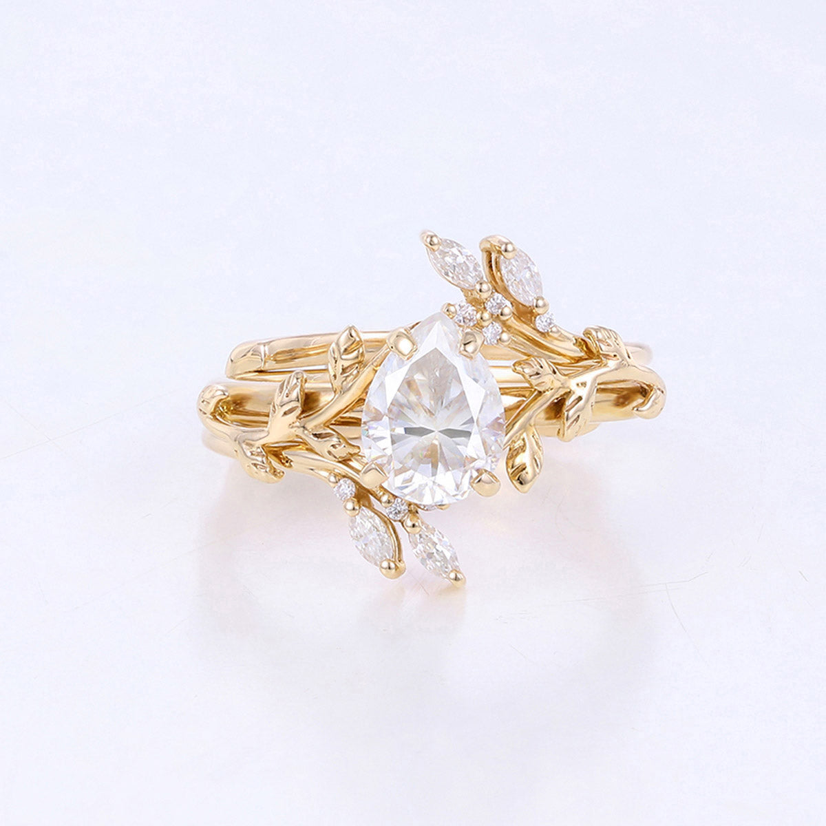 Nature Inspired Pear cut Moissanite Leaf Gold ring set