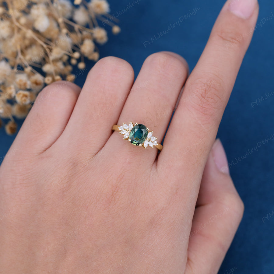 Oval Blue-Green Sapphire Cluster Engagement ring