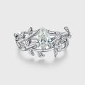 Nature Inspired Pear cut Moissanite Leaf Gold ring set