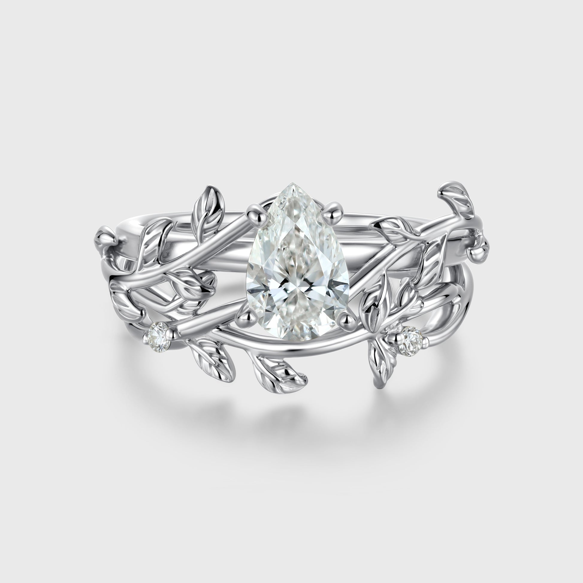Nature Inspired Pear cut Moissanite Leaf Gold ring set