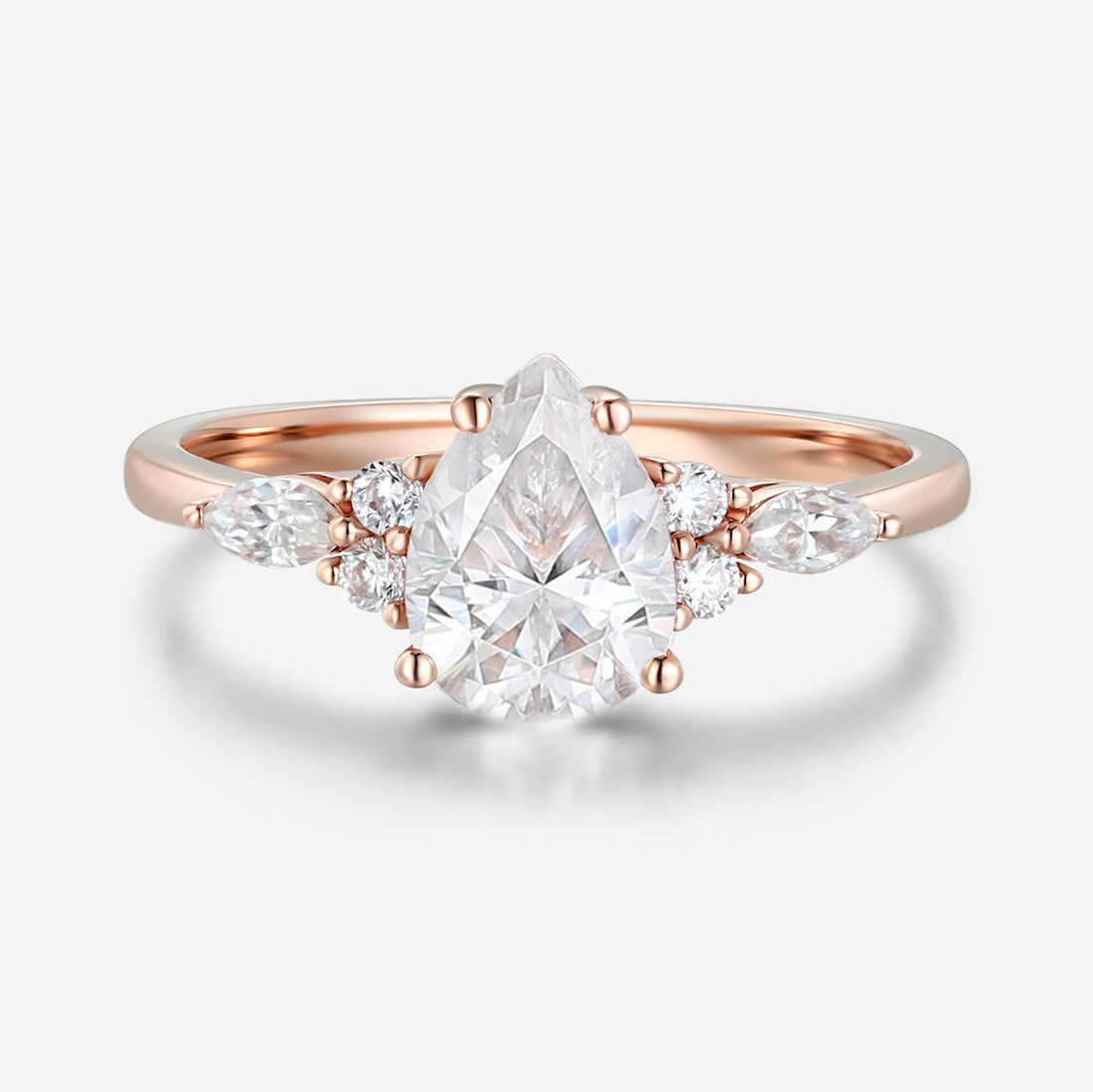 1.25 Carat Pear cut Moissanite Cluster Engagement ring