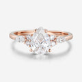 1.25 Carat Pear cut Moissanite Cluster Engagement ring