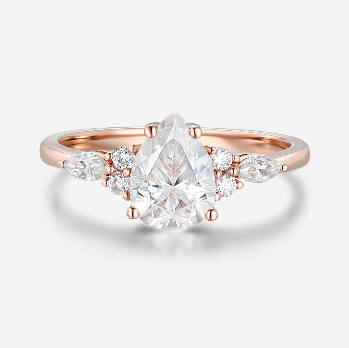 1.25 Carat Pear cut Moissanite Cluster Engagement ring