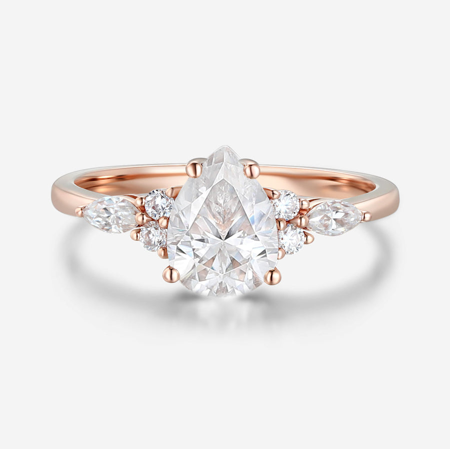 1.25 Carat Pear cut Moissanite Cluster Engagement ring