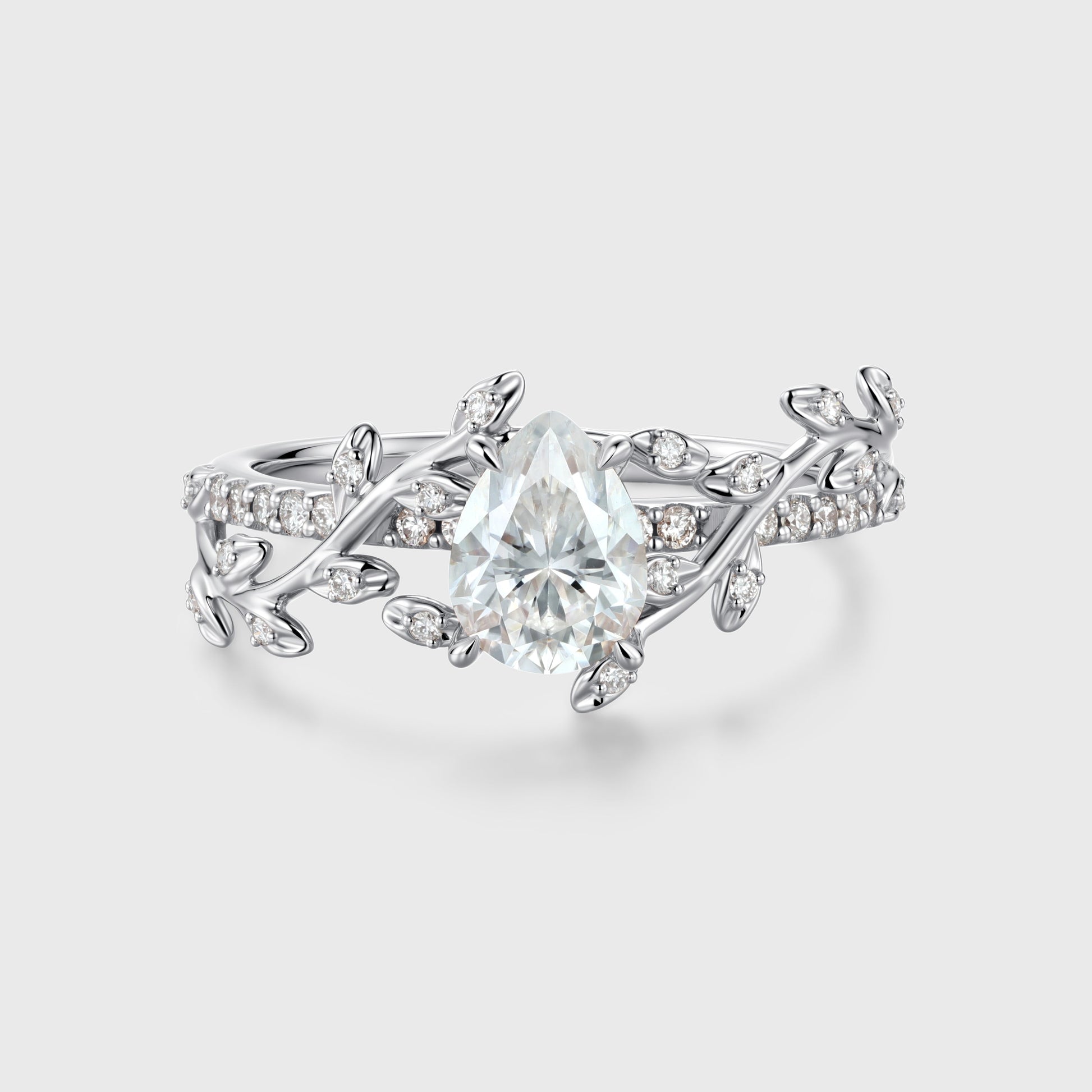Nature Inspired Pear cut Moissanite Leaf Gold Engagement Ring