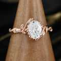 Nature Inspired Oval cut Moissanite Leaf Gold Engagement Ring