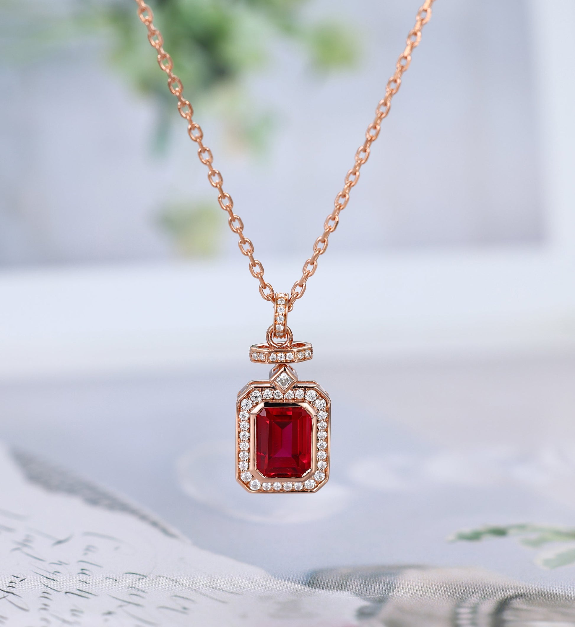 Emerald cut Lab Ruby Pendant Necklace with Moissanite Halo Accents