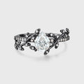 Nature Inspired Pear cut Moissanite Leaf Gold Engagement Ring