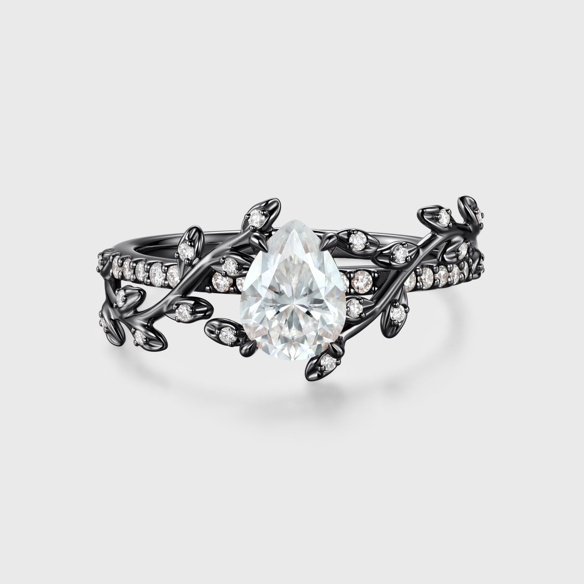 Nature Inspired Pear cut Moissanite Leaf Gold Engagement Ring