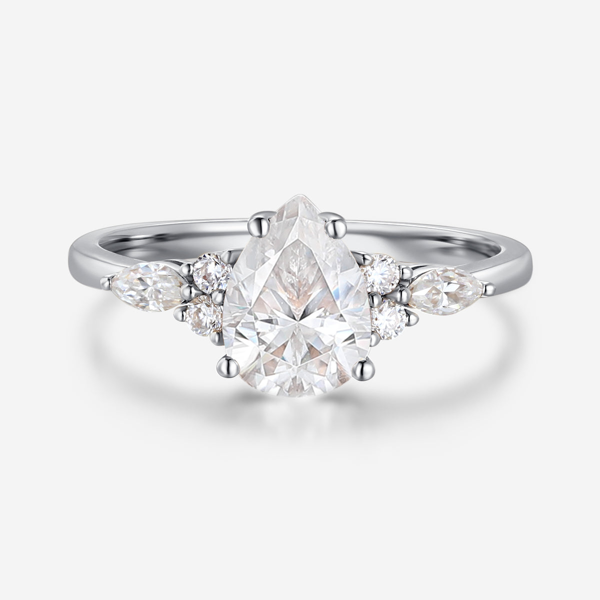 1.25 Carat Pear cut Moissanite Cluster Engagement ring