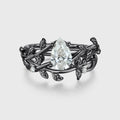 Nature Inspired Pear cut Moissanite Leaf Gold ring set
