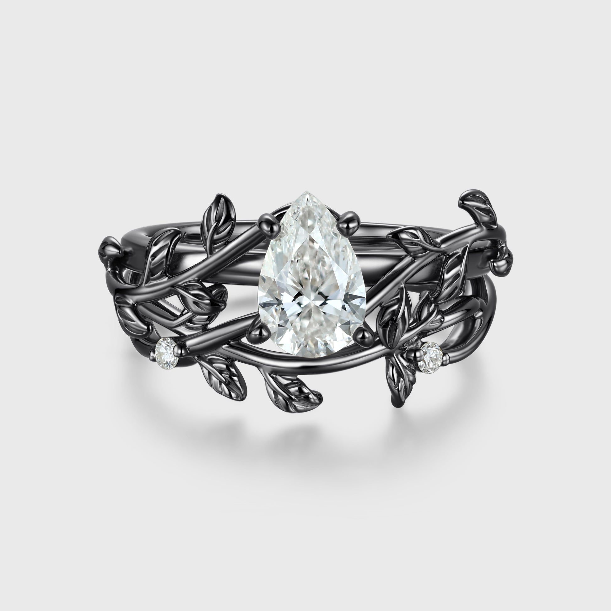 Nature Inspired Pear cut Moissanite Leaf Gold ring set