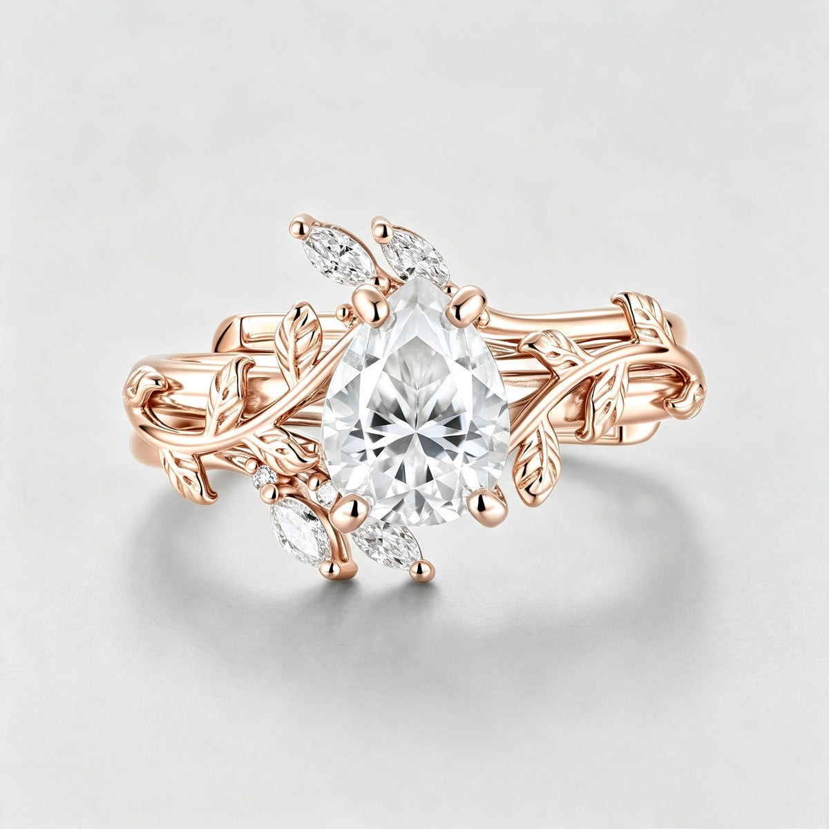 Nature Inspired Pear cut Moissanite Leaf Gold ring set
