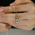 Oval cut Moonstone Pendant Necklace with Diamonds Halo Accents