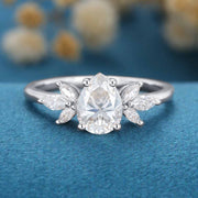 1.2Carat Pear cut Moissanite Cluster Engagement ring