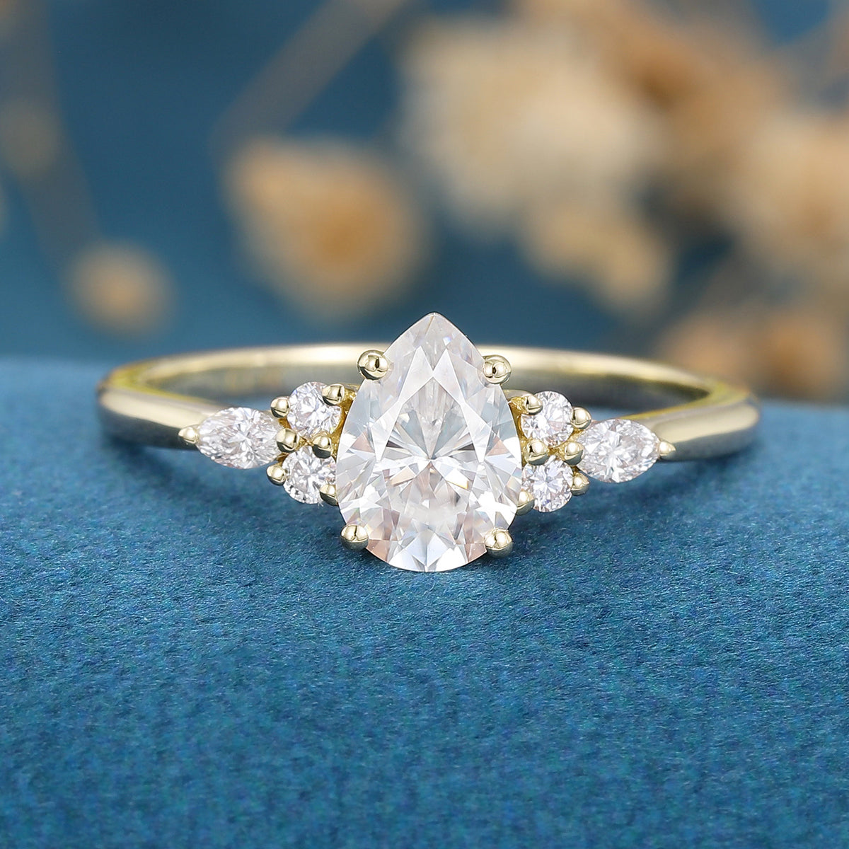 1.25 Carat Pear cut Moissanite Cluster Engagement ring