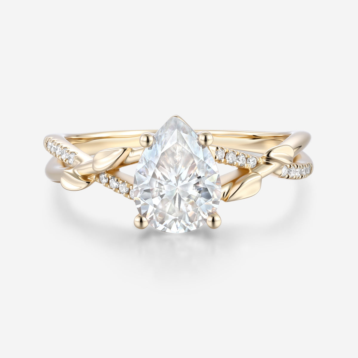 Nature Inspired Pear cut Moissanite Leaf Gold Engagement Ring