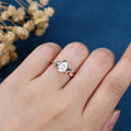 Pear cut Moissanite Engagement ring + Lab Emerald Engagement Ring