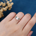 Pear cut Moissanite + Lab Emerald Engagement Ring