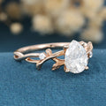 Nature Inspired Pear cut Moissanite Leaf Gold Engagement Ring