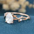 Nature Inspired Pear cut Moissanite Leaf Gold Engagement Ring