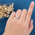 Nature Inspired Pear cut Moissanite Leaf Gold Engagement Ring