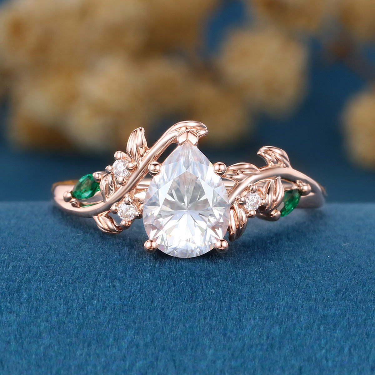 Nature Inspired Pear cut Moissanite + Lab Emerald Engagement Ring
