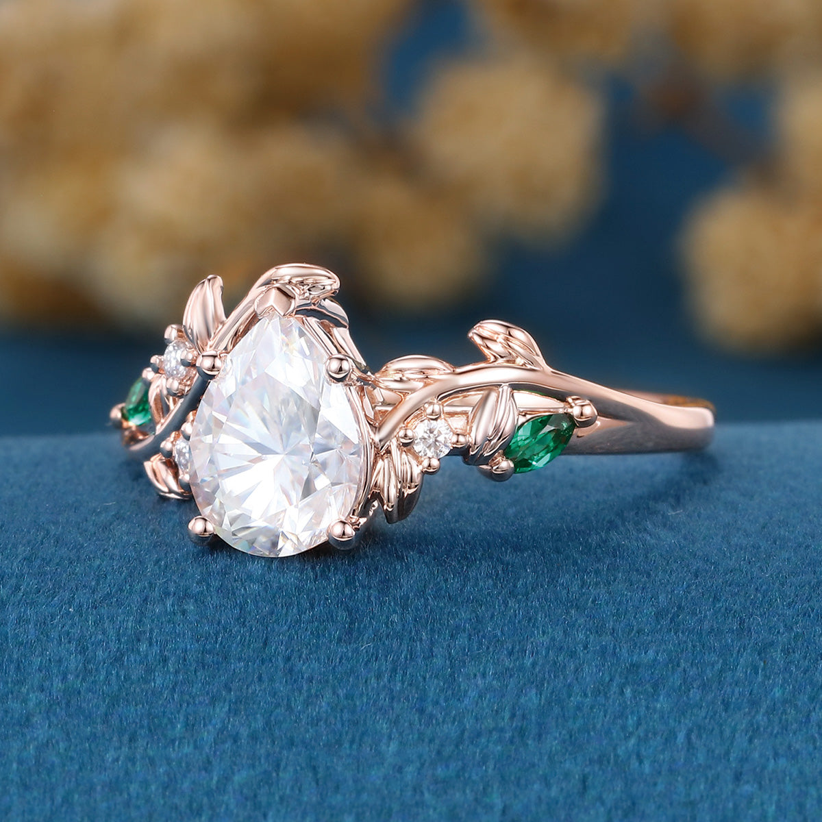 Nature Inspired Pear cut Moissanite + Lab Emerald Engagement Ring