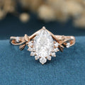 Nature Inspired Pear cut Moissanite Leaf Gold Engagement Ring