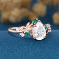 Pear cut Moissanite Engagement ring + Lab Emerald Engagement Ring