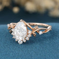 Nature Inspired Pear cut Moissanite Leaf Gold Engagement Ring