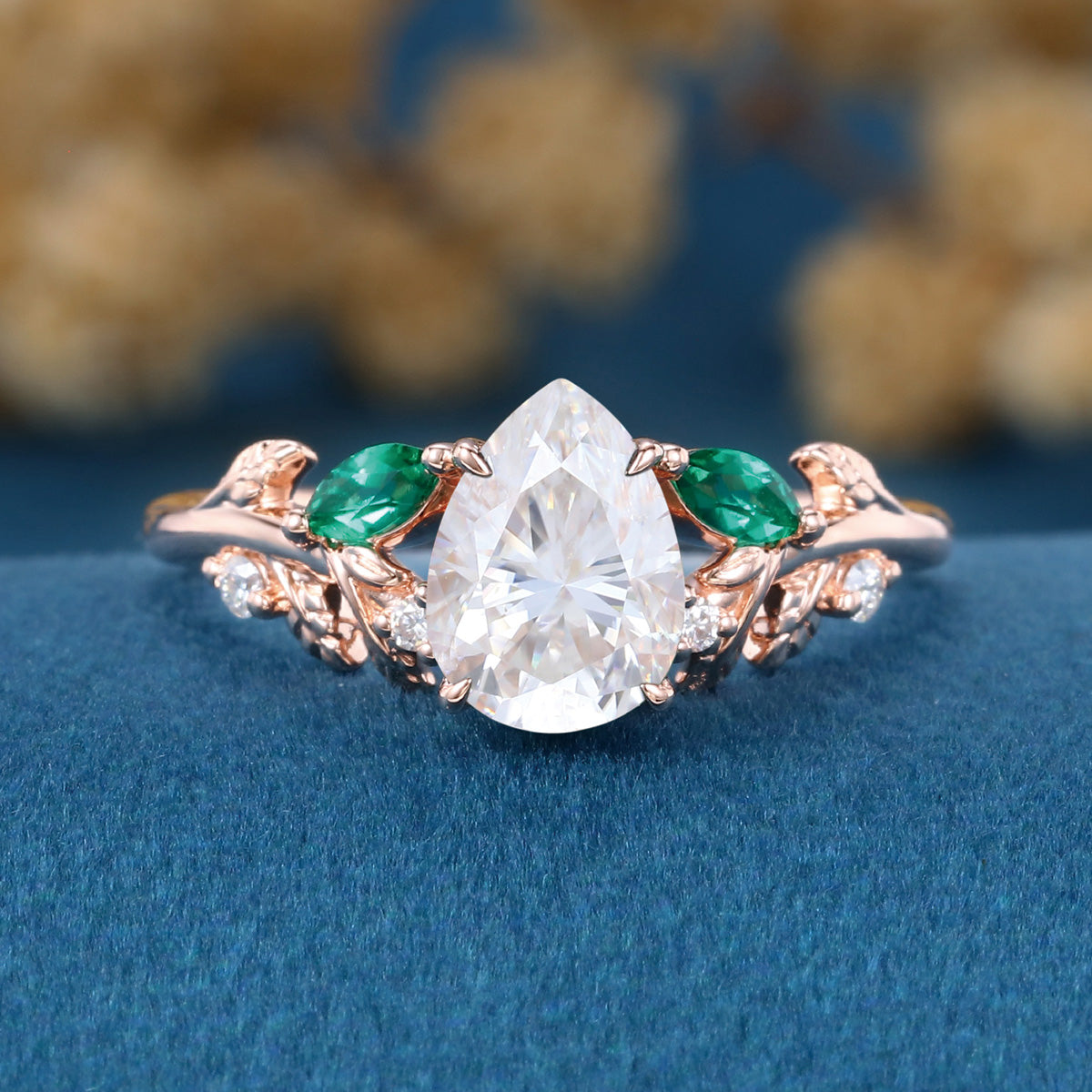 Pear cut Moissanite + Lab Emerald Engagement Ring