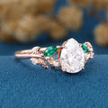 Pear cut Moissanite + Lab Emerald Engagement Ring