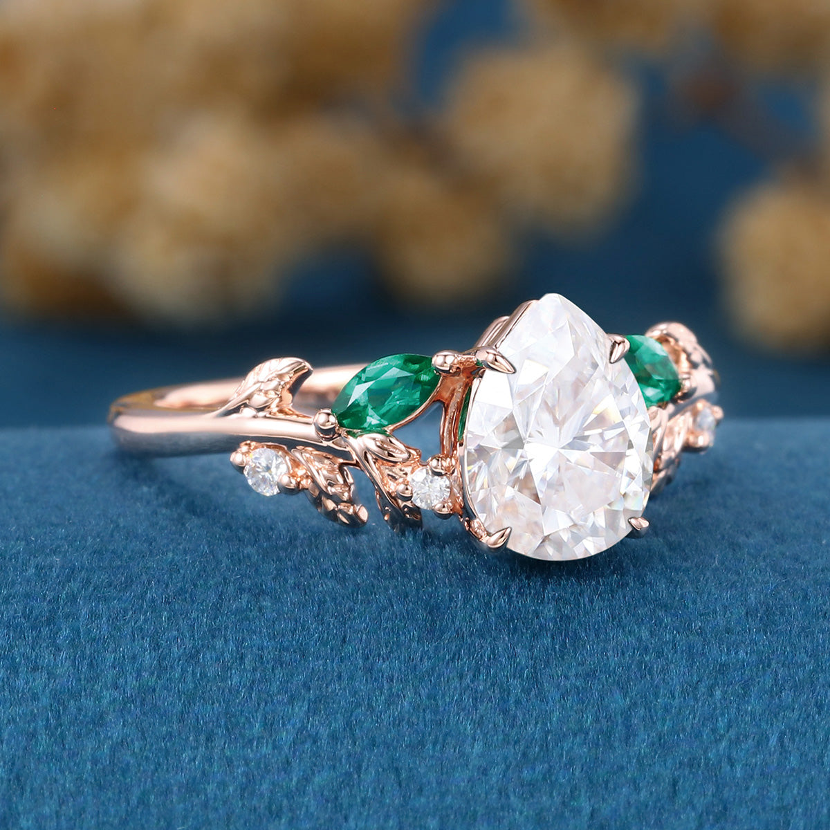 Pear cut Moissanite + Lab Emerald Engagement Ring