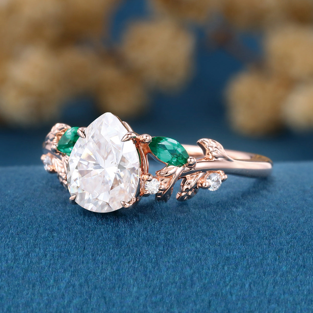 Pear cut Moissanite + Lab Emerald Engagement Ring