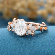 Pear cut Moissanite leaf design Gold Engagement Ring