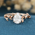 Nature Inspired Pear cut Moissanite Leaf Gold Engagement Ring