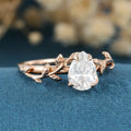 Nature Inspired Pear cut Moissanite Leaf Gold Engagement Ring