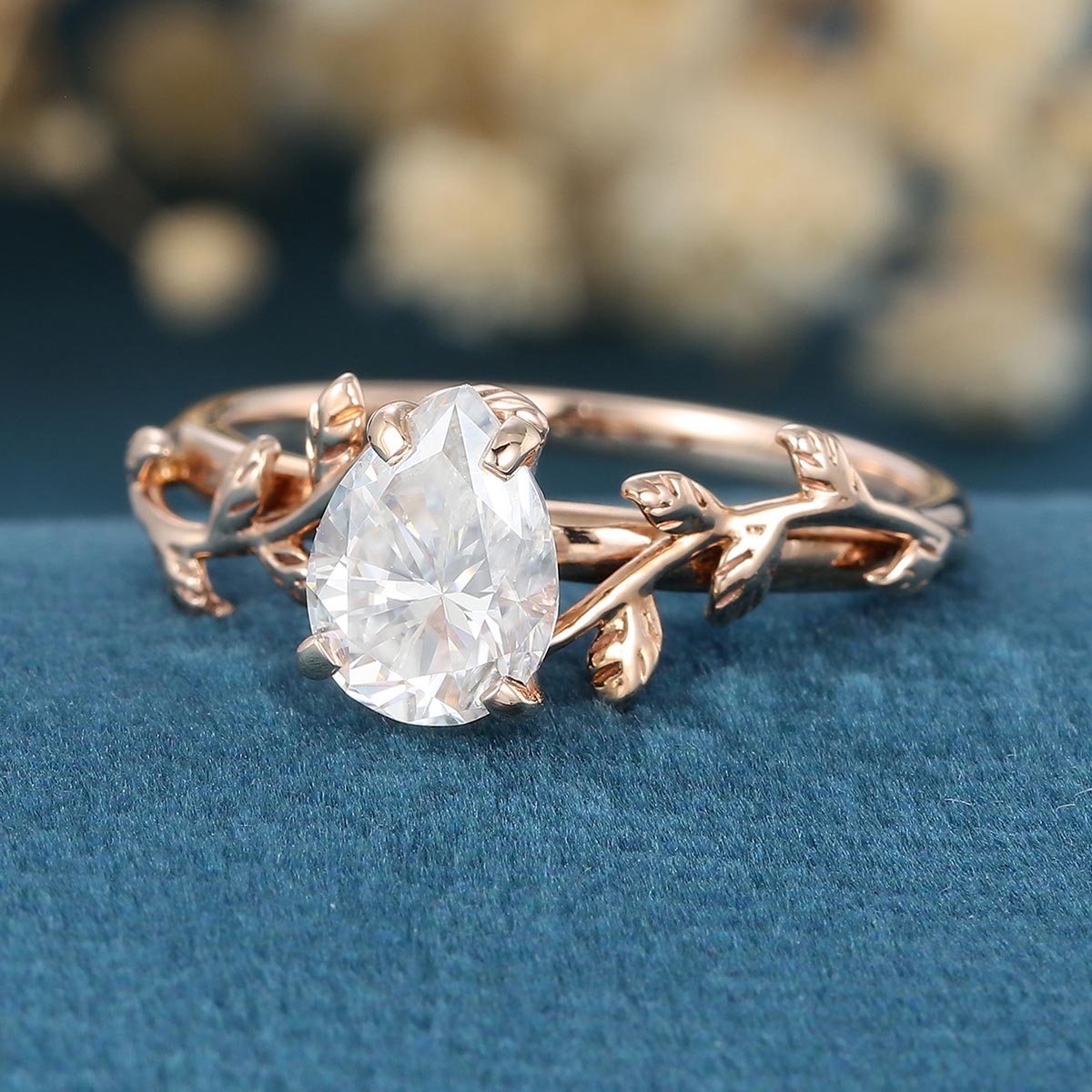 Nature Inspired Pear cut Moissanite Leaf Gold Engagement Ring