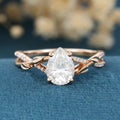 Nature Inspired Pear cut Moissanite Leaf Gold Engagement Ring