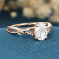 Nature Inspired Pear cut Moissanite Leaf Gold Engagement Ring