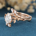 Nature Inspired Pear cut Moissanite Leaf Gold ring set